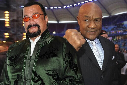 George Foreman Bizarrely Challenges Steven Seagal To Boxing Match